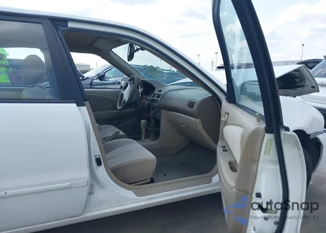 2002 Toyota Corolla Le from USA, damaged, VIN 1NXBR12E02Z612932